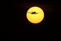 aircraft crossing suns disk